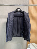 Prada puffer jacket open back view with dark padded lining
