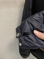 Prada puffer jacket sleeve cuff and button detail, dark outerwear