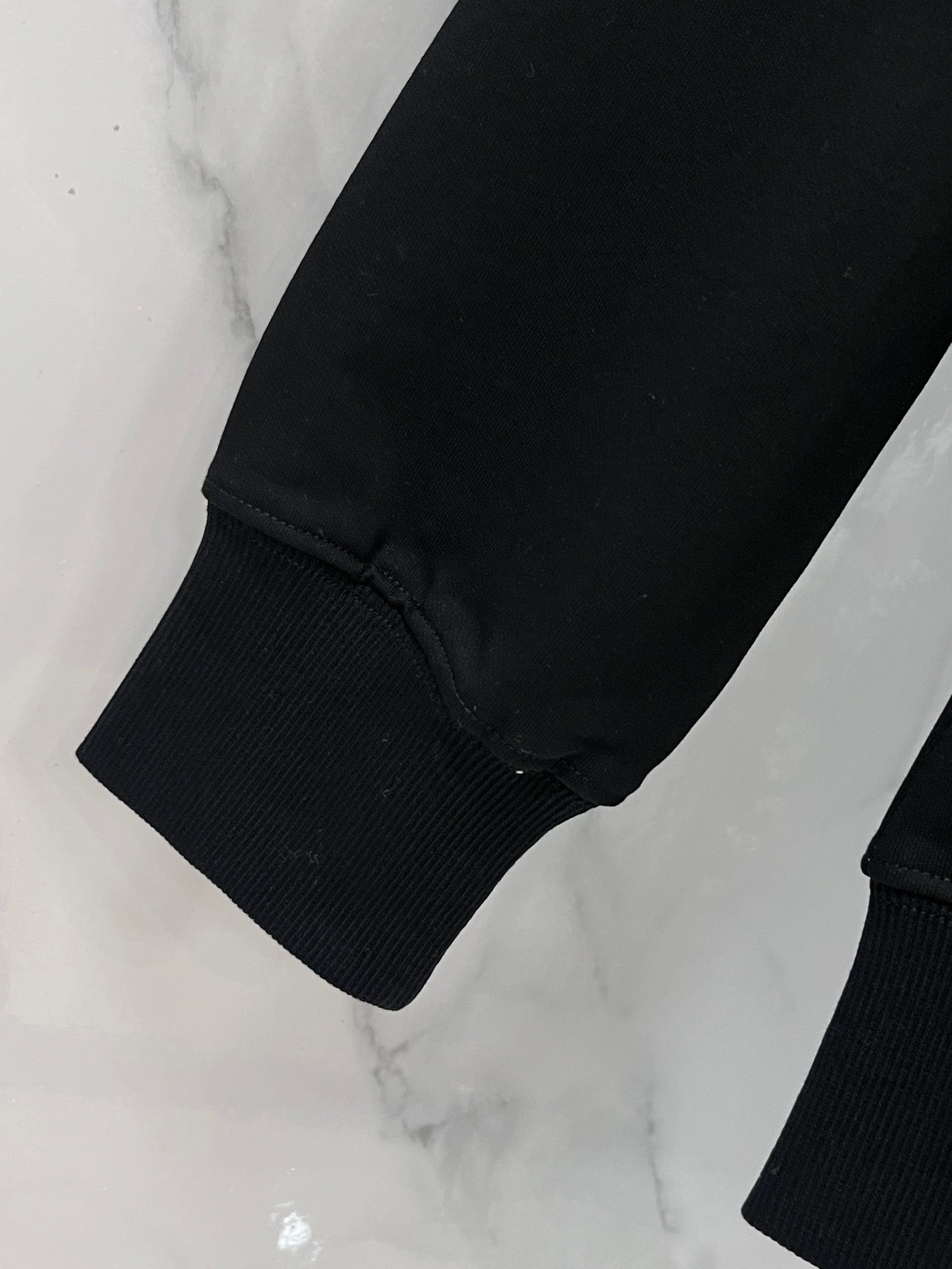 Versace crewneck sweatshirt ribbed cuff and hem on dark sleeve