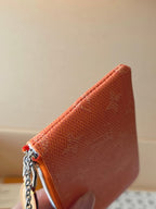 Orange monogram pouch corner with silver chain and zipper pull