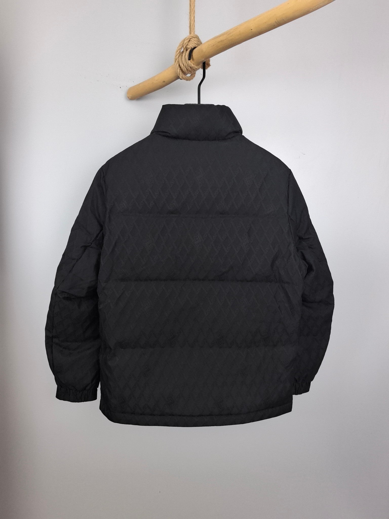 Black Burberry quilted jacket back view with stand collar and zip