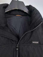 Black Burberry quilted jacket interior lining and full-length zipper
