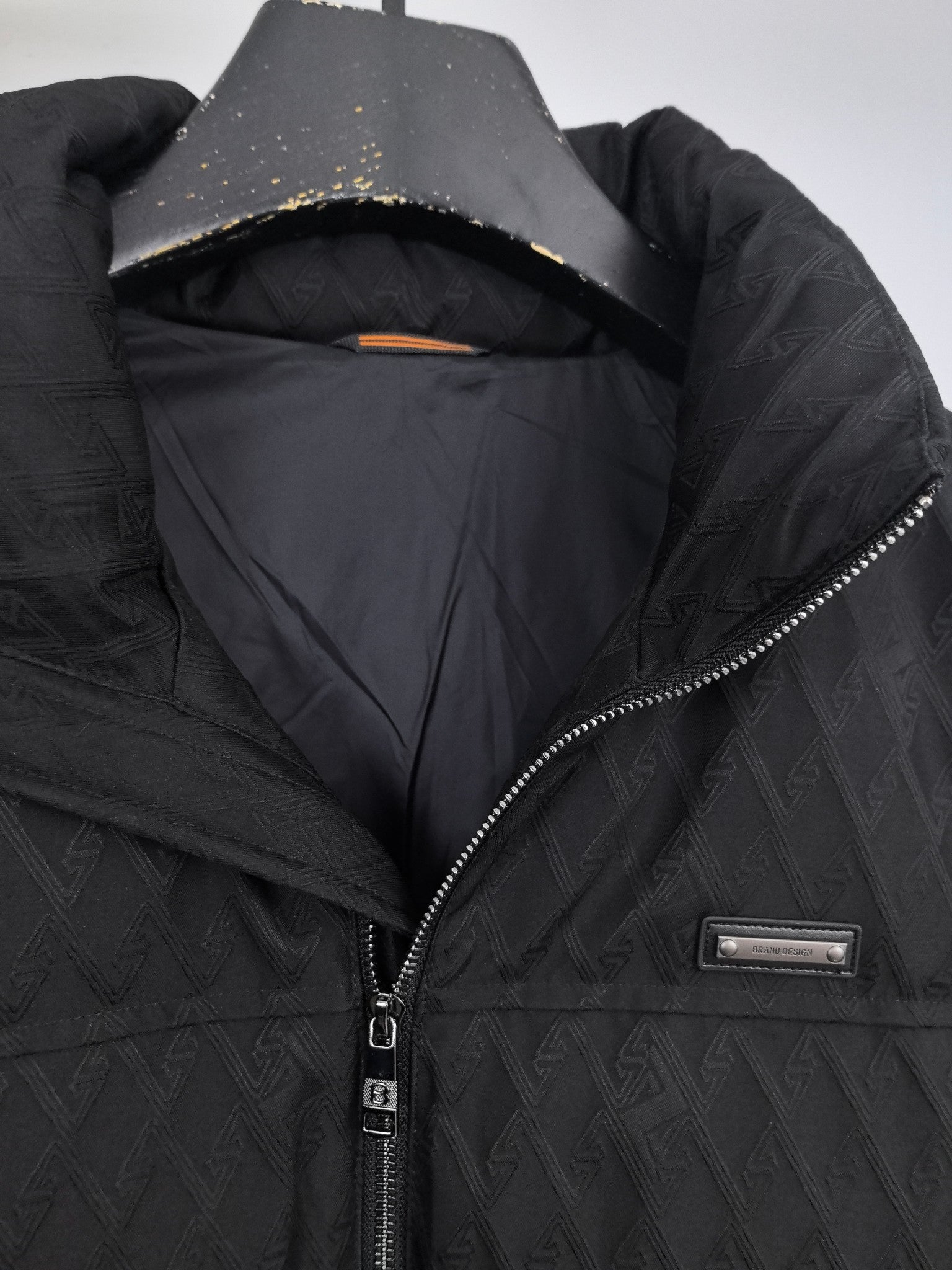 Black Burberry quilted jacket interior lining and full-length zipper