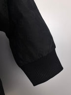 Louis Vuitton black quilted jacket sleeve cuff with ribbed knit trim
