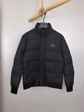 Black long-sleeve puffer jacket with full zipper and small chest logo patch