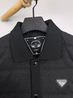 Prada puffer jacket collar with woven logo badge and dark button front