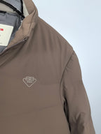 Prada puffer jacket taupe with embossed logo on sleeve