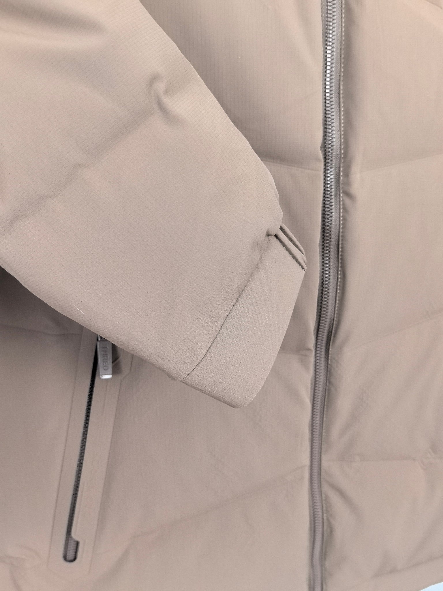Prada puffer jacket taupe with zip and adjustable drawstring cuff