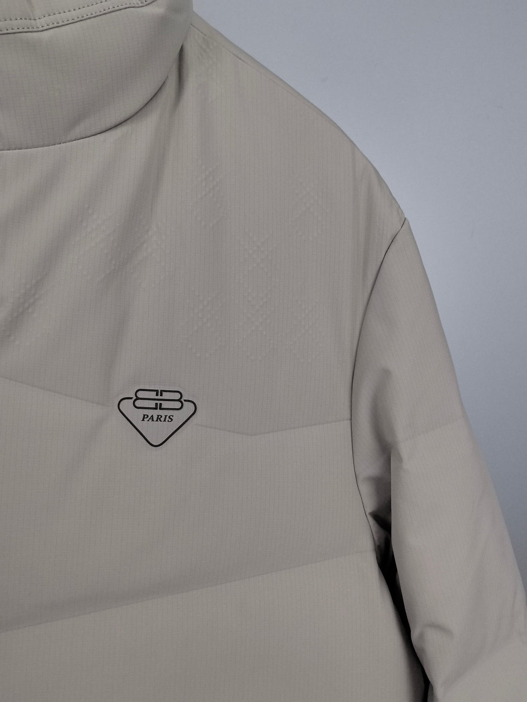 Light beige padded jacket chest logo and stand collar
