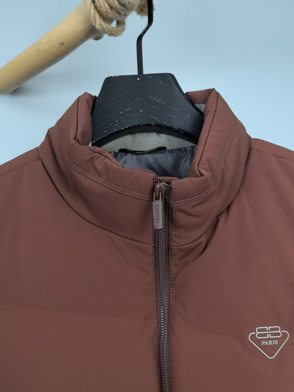 Prada long padded jacket, maroon-brown, hooded stand collar and front zipper close-up