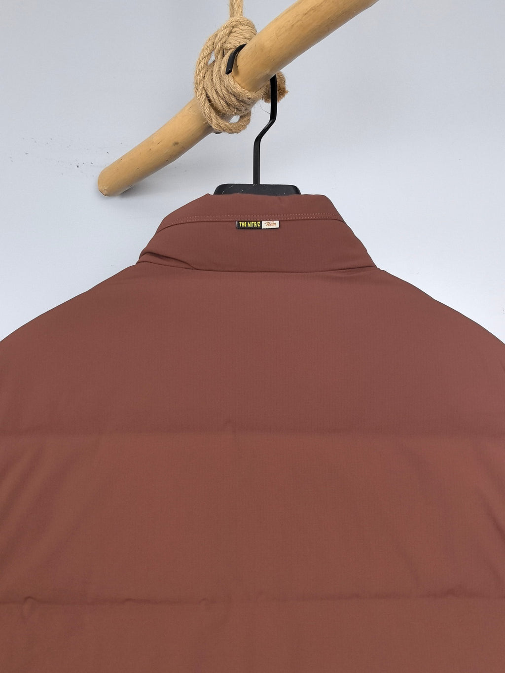 Prada long padded jacket, maroon-brown, back view with small neck label