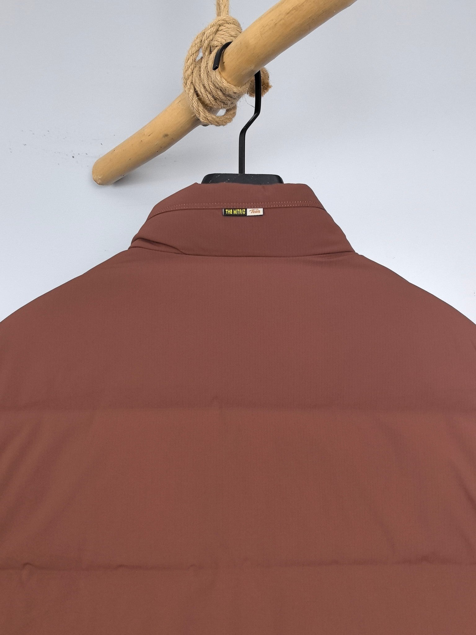 Prada long padded jacket, maroon-brown, back view with small neck label