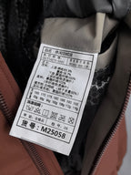 Prada long padded jacket care label inside front placket, size and material info