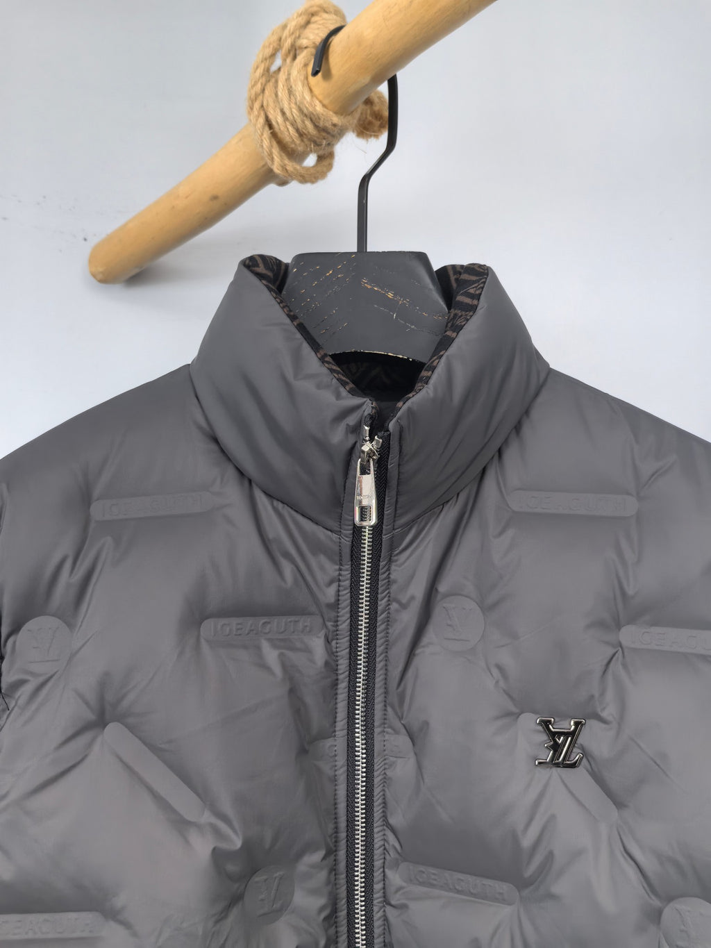 Louis Vuitton puffer jacket, dark gray, front collar and silver zipper detail