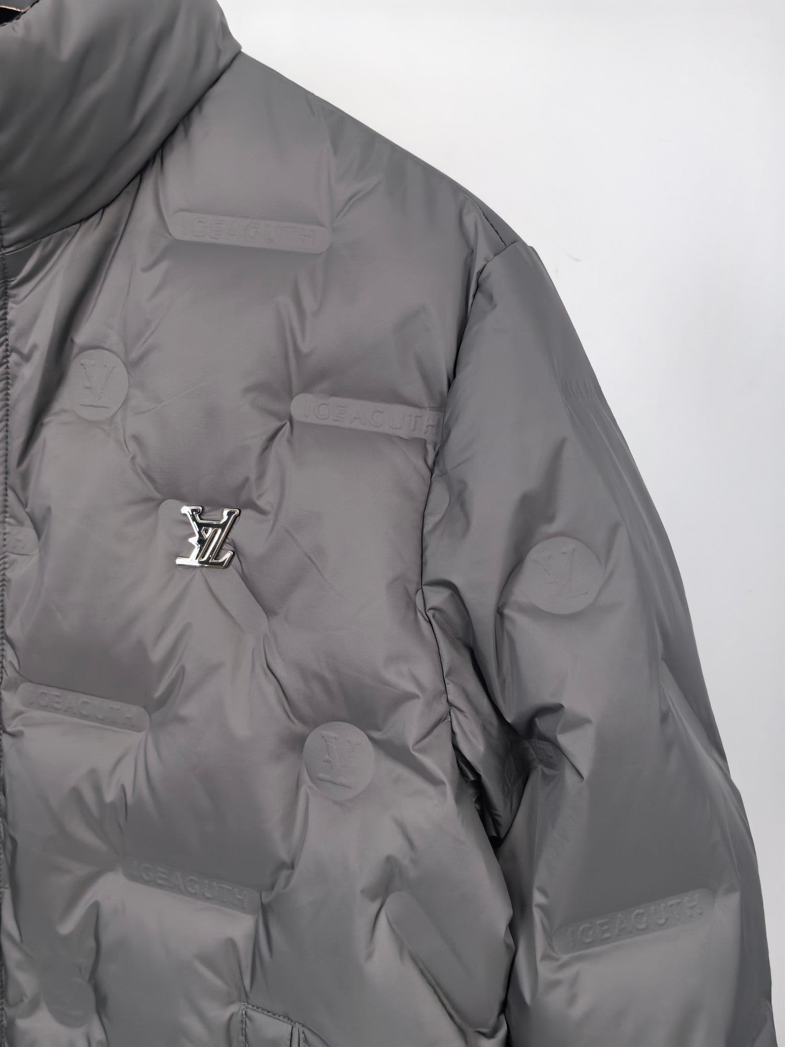 Louis Vuitton puffer jacket, dark gray, chest logo detail and quilting