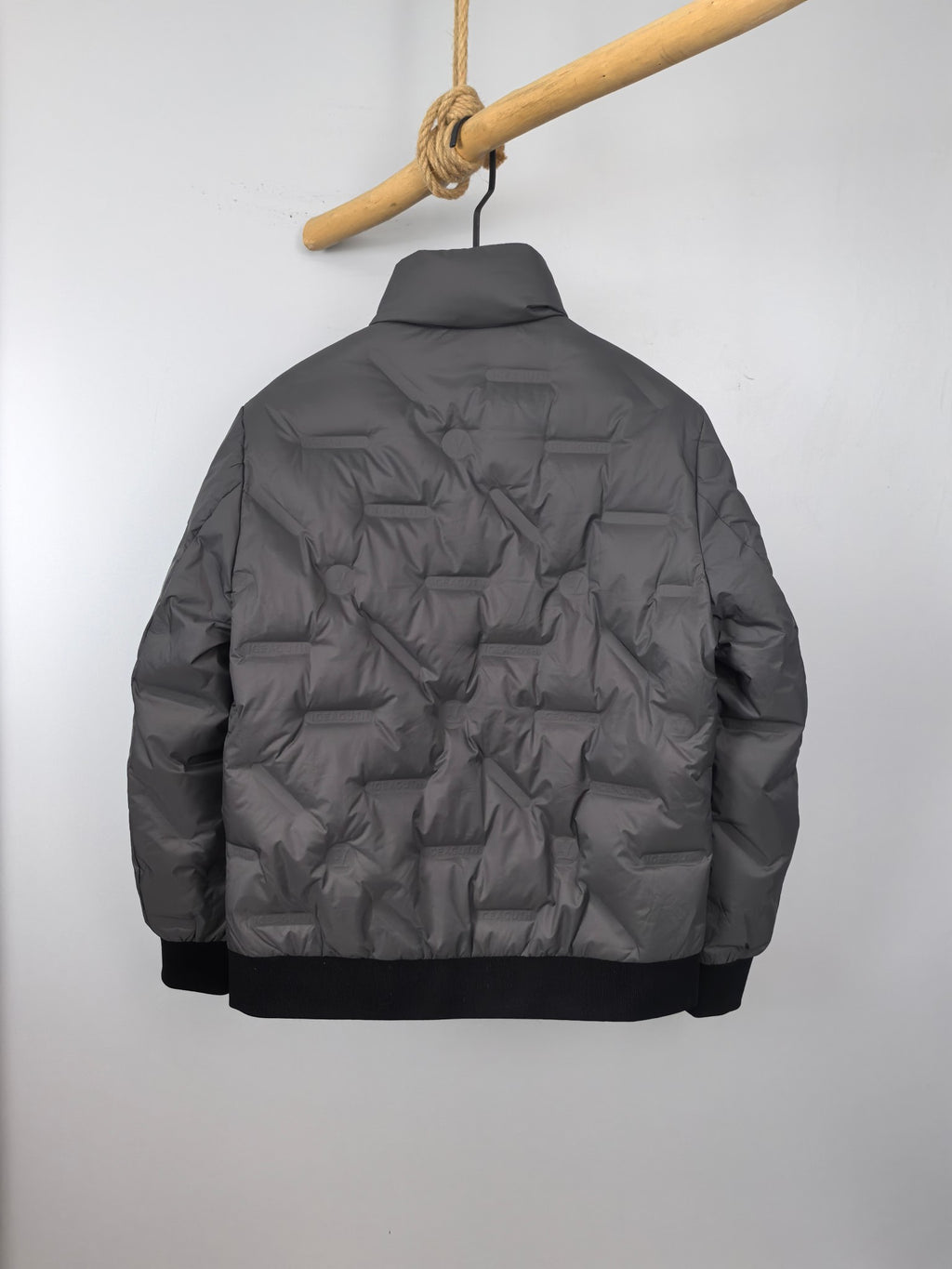 Louis Vuitton puffer jacket, dark gray, back view with stand collar
