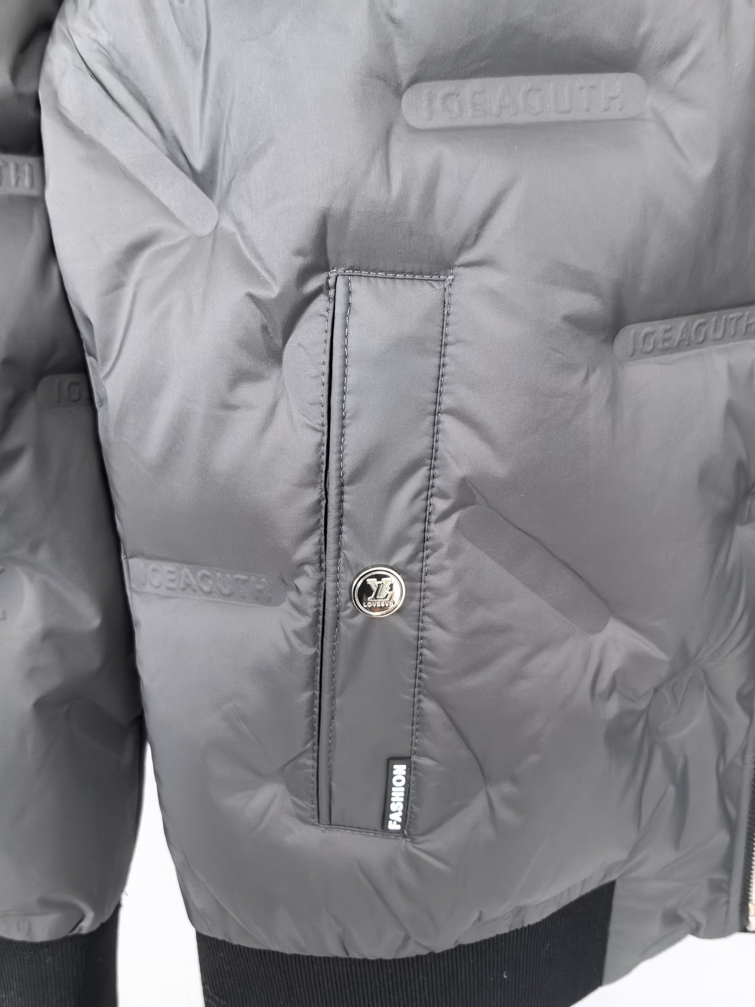 Louis Vuitton puffer jacket inner pocket panel with brand patch and stitching