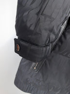 Prada puffer jacket sleeve cuff with snap tab and inner drawstring adjustment