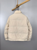 Burberry puffer jacket, back view in cream with horizontal baffles
