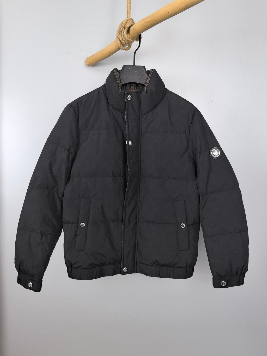 Long puffer jacket, black, front zip with snap buttons and stand collar