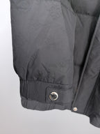 Long puffer jacket, black, adjustable hem with logo patch and snap