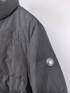 Long puffer jacket, black, side sleeve with circular logo patch