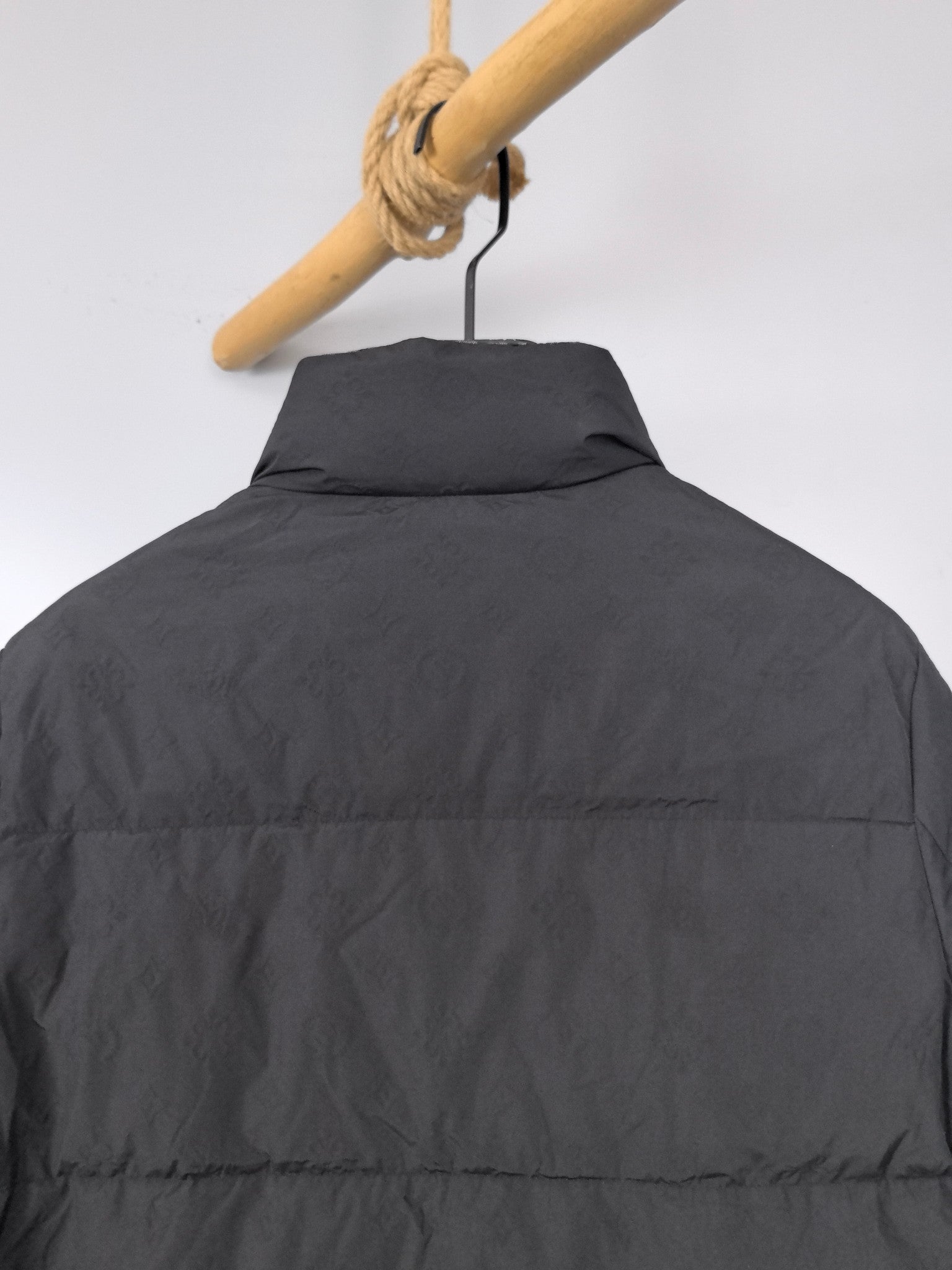 Long puffer jacket, black, back view with high collar