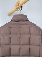 Brown puffer jacket back view with quilted yoke and horizontal seams