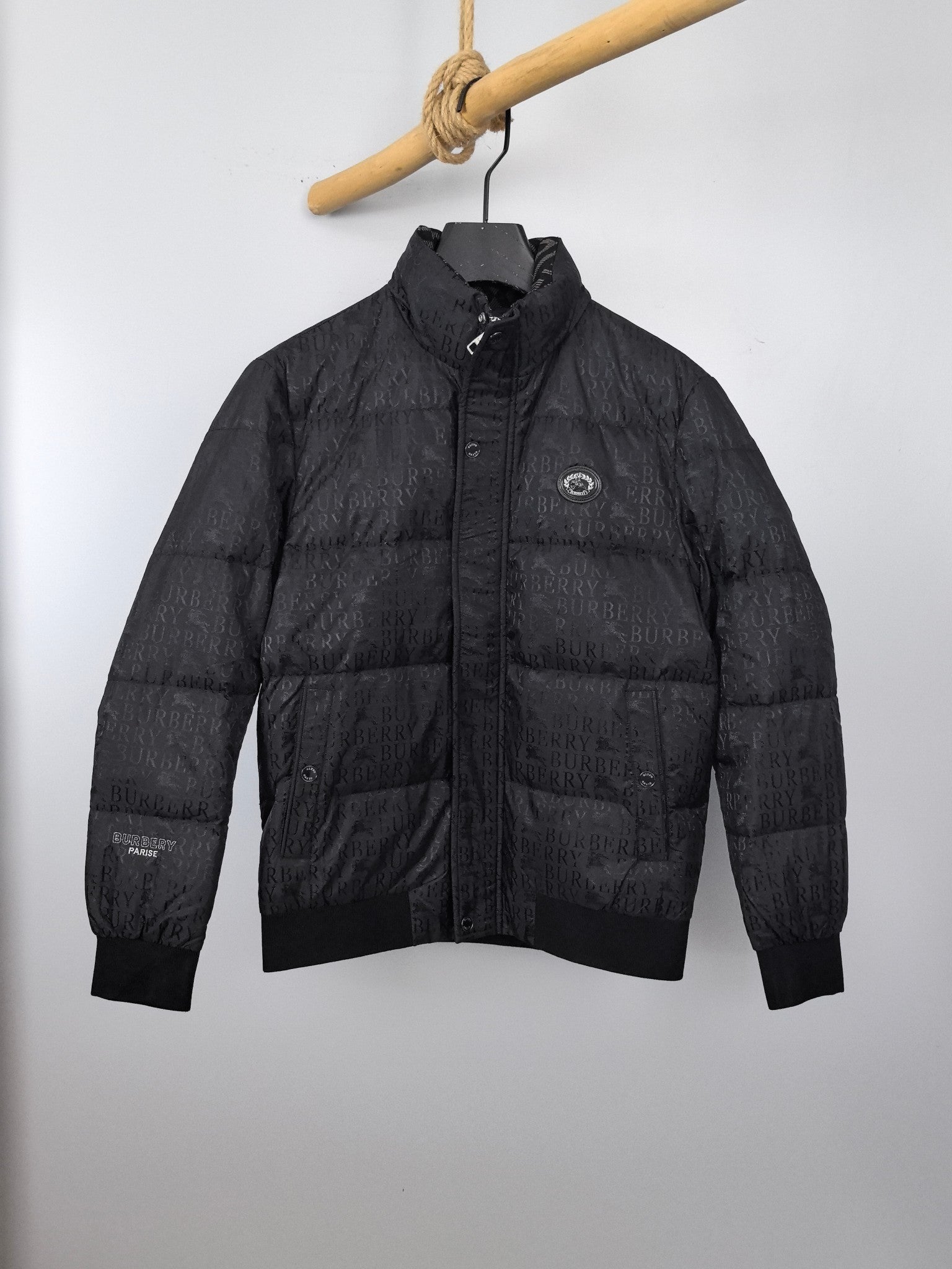 Burberry long black puffer jacket with full zip and stand collar