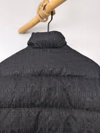 Long black puffer jacket back close-up with hood and raised collar