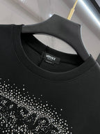Versace sweatshirt neckline close-up, ribbed crew neck and logo label