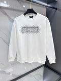 White crewneck sweatshirt with rhinestone logo on the chest