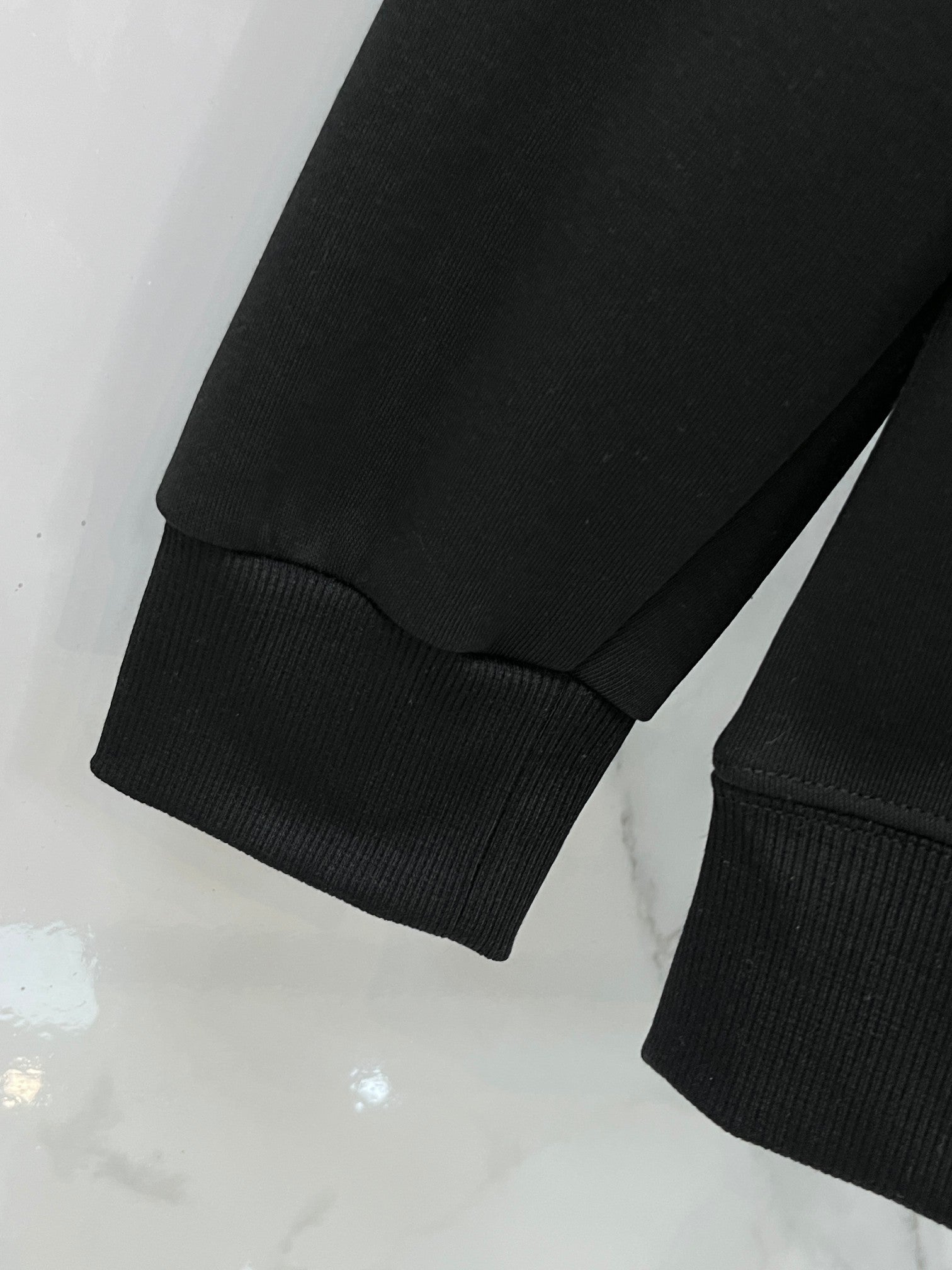 Versace sweatshirt sleeves and hem, ribbed cuffs and waistband