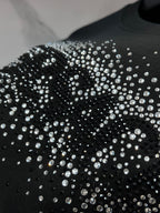 Versace sweatshirt glitter rhinestone graphic close-up