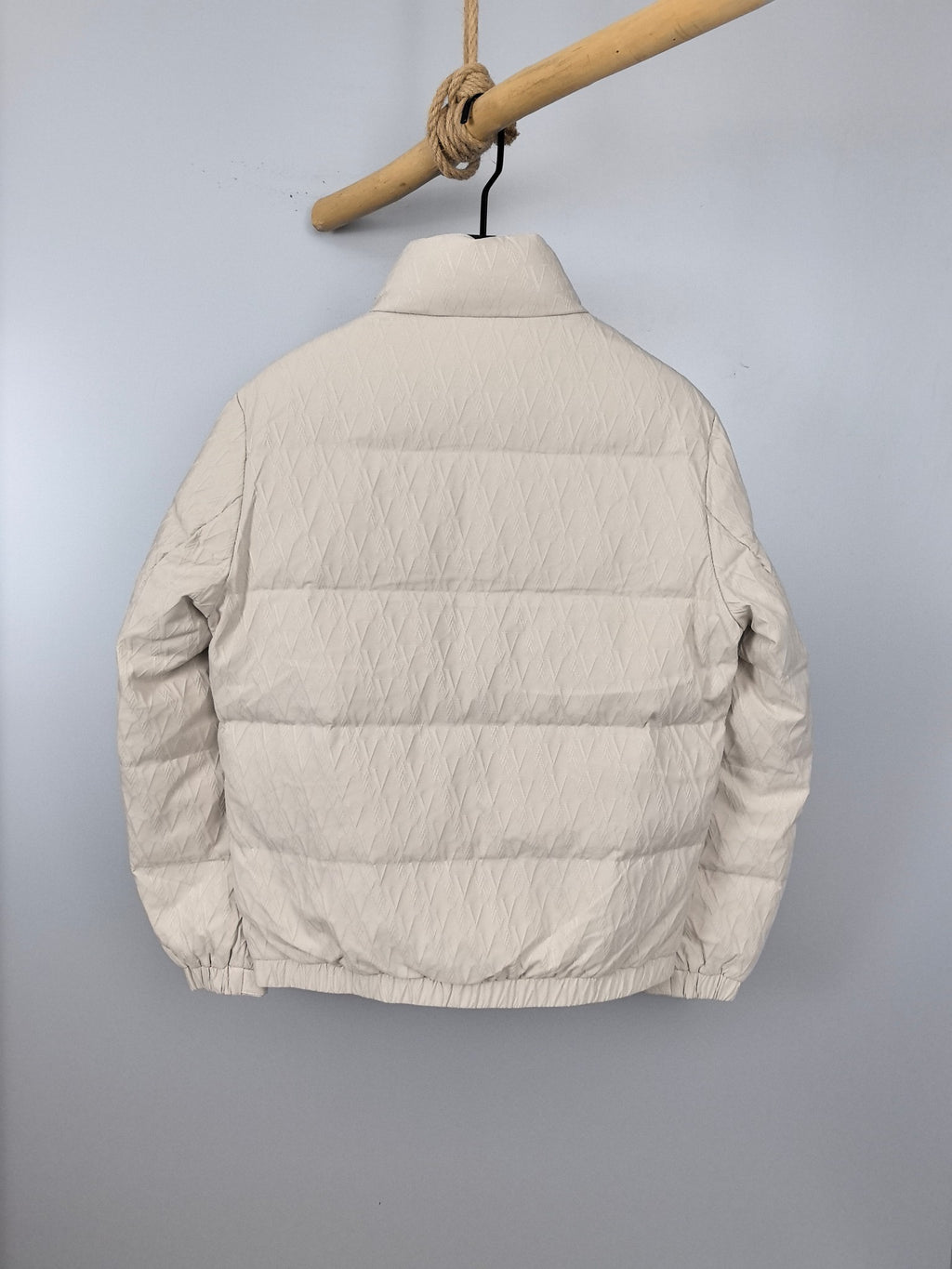 Louis Vuitton white puffer jacket back view with horizontal quilting