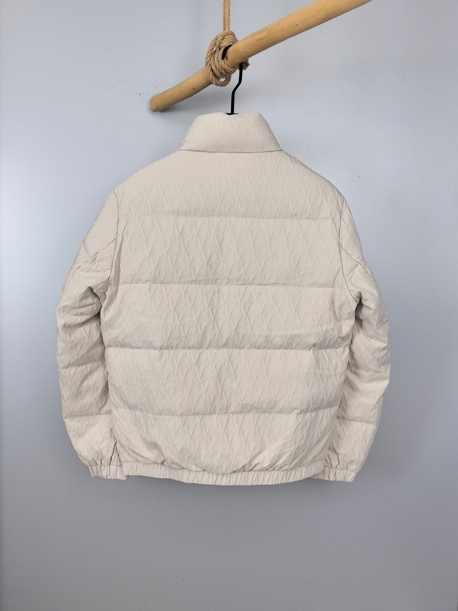 Louis Vuitton white puffer jacket back view with horizontal quilting