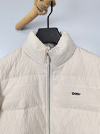 Louis Vuitton white puffer jacket zip front and raised logo on chest