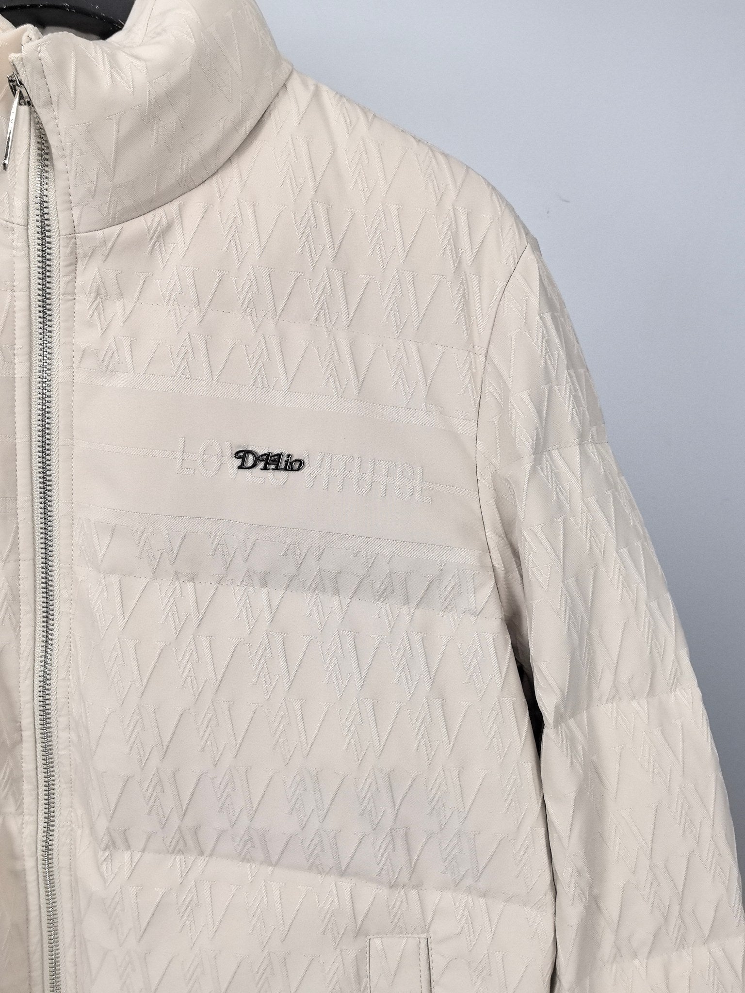 Louis Vuitton white puffer jacket with small chest logo on zip front