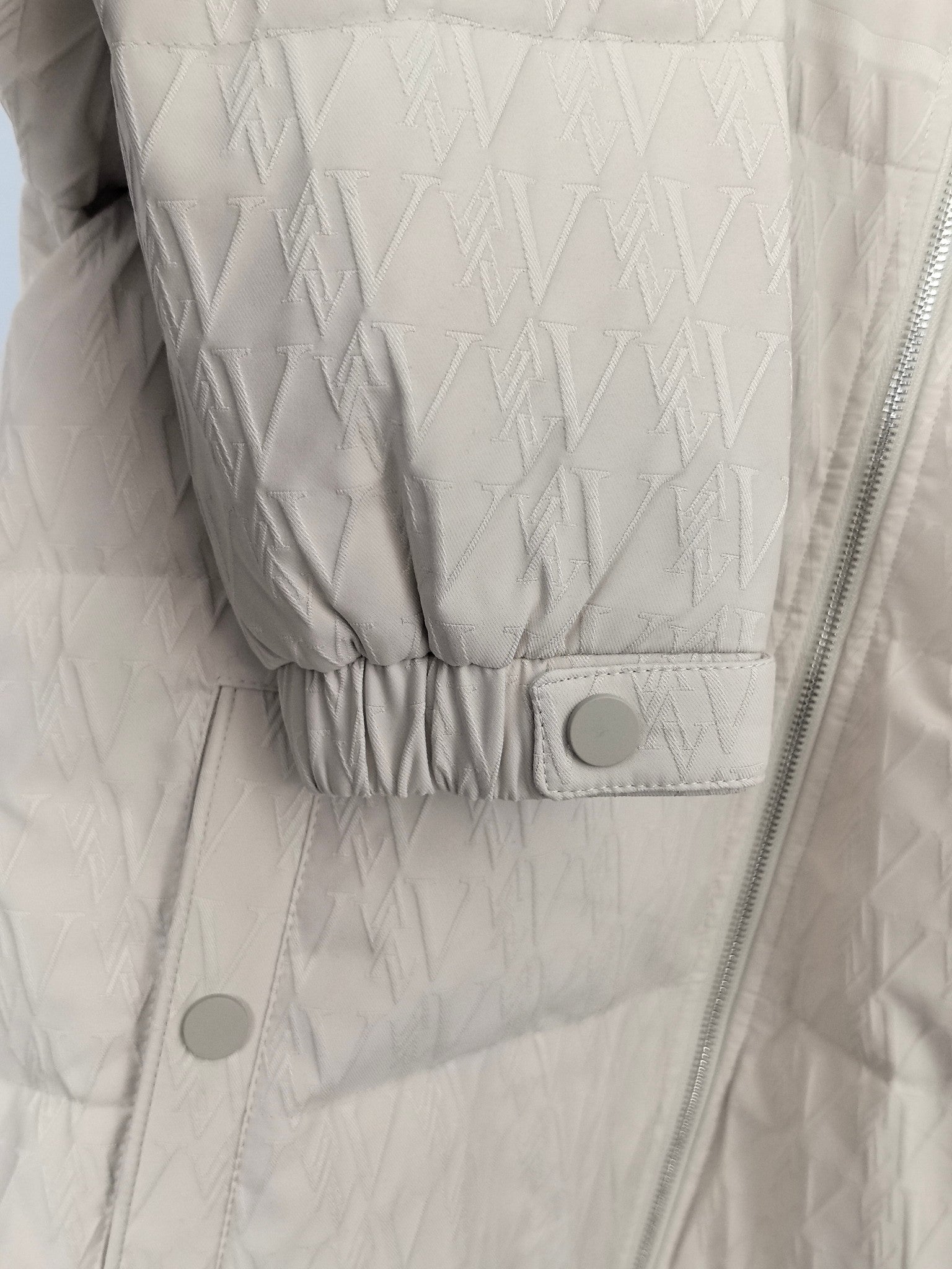 Louis Vuitton white puffer jacket with elastic drawstring hem and snap