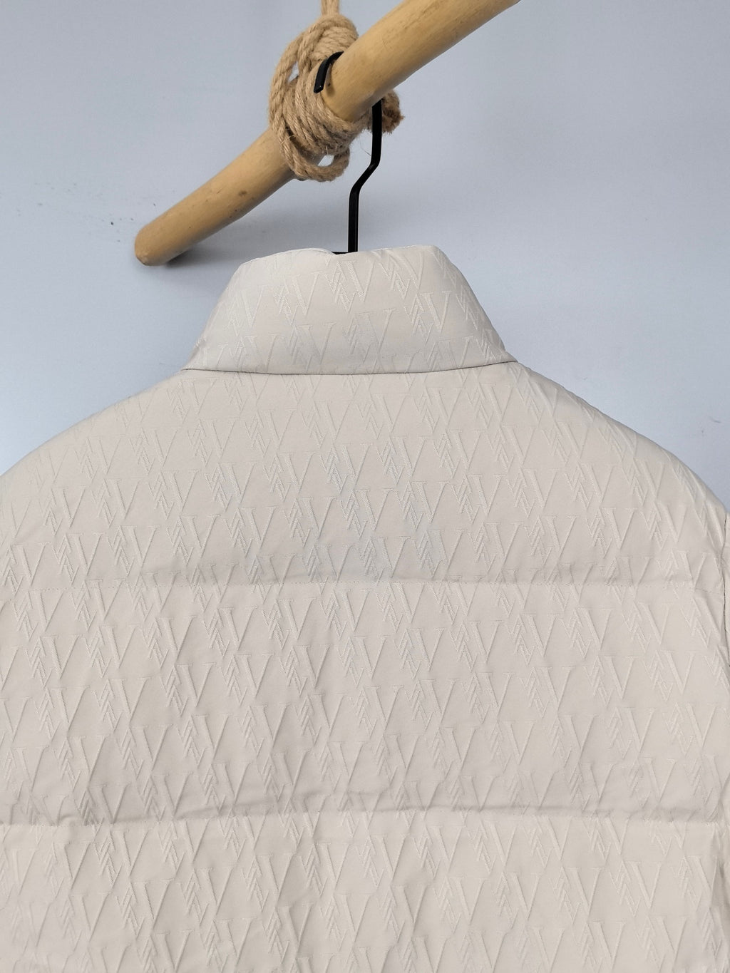 Louis Vuitton white puffer jacket back view with high collar and quilted stripes