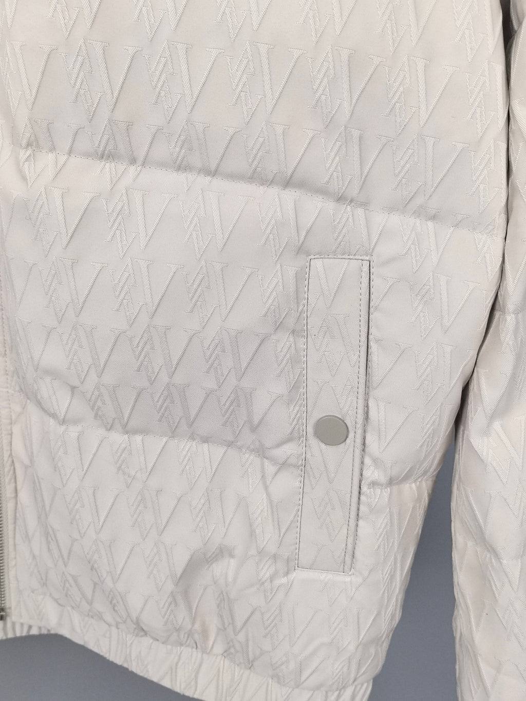 Louis Vuitton white puffer jacket with snap flap pocket detail