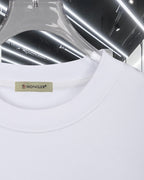 White crewneck sweatshirt with Moncler label at neckline