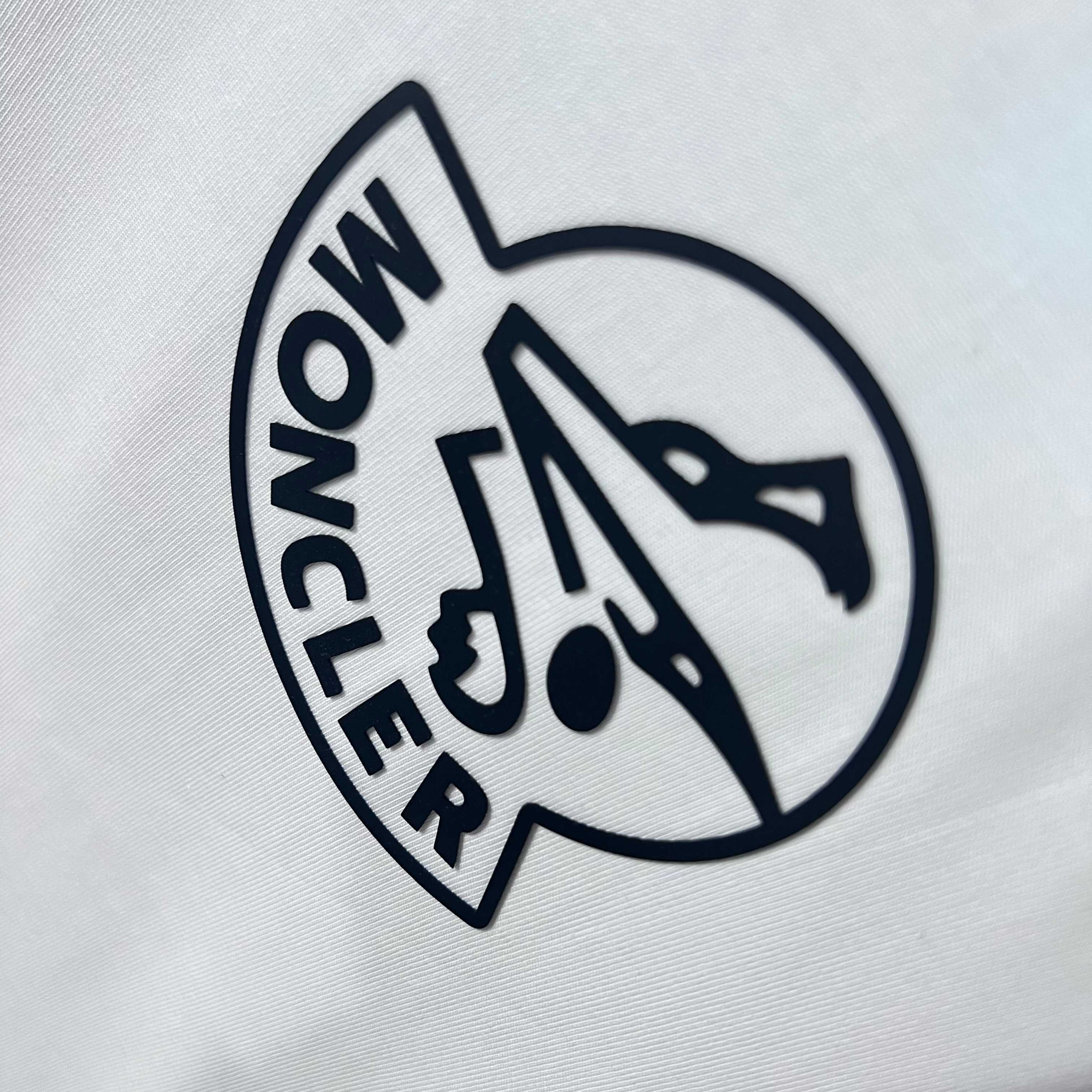 Moncler crest logo print on white sweatshirt