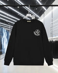 Black long-sleeve crewneck sweatshirt with Moncler circular chest logo