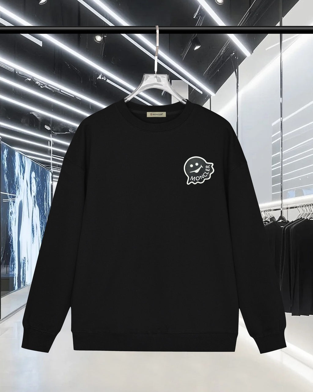 Moncler black long-sleeve crewneck sweatshirt with chest logo patch
