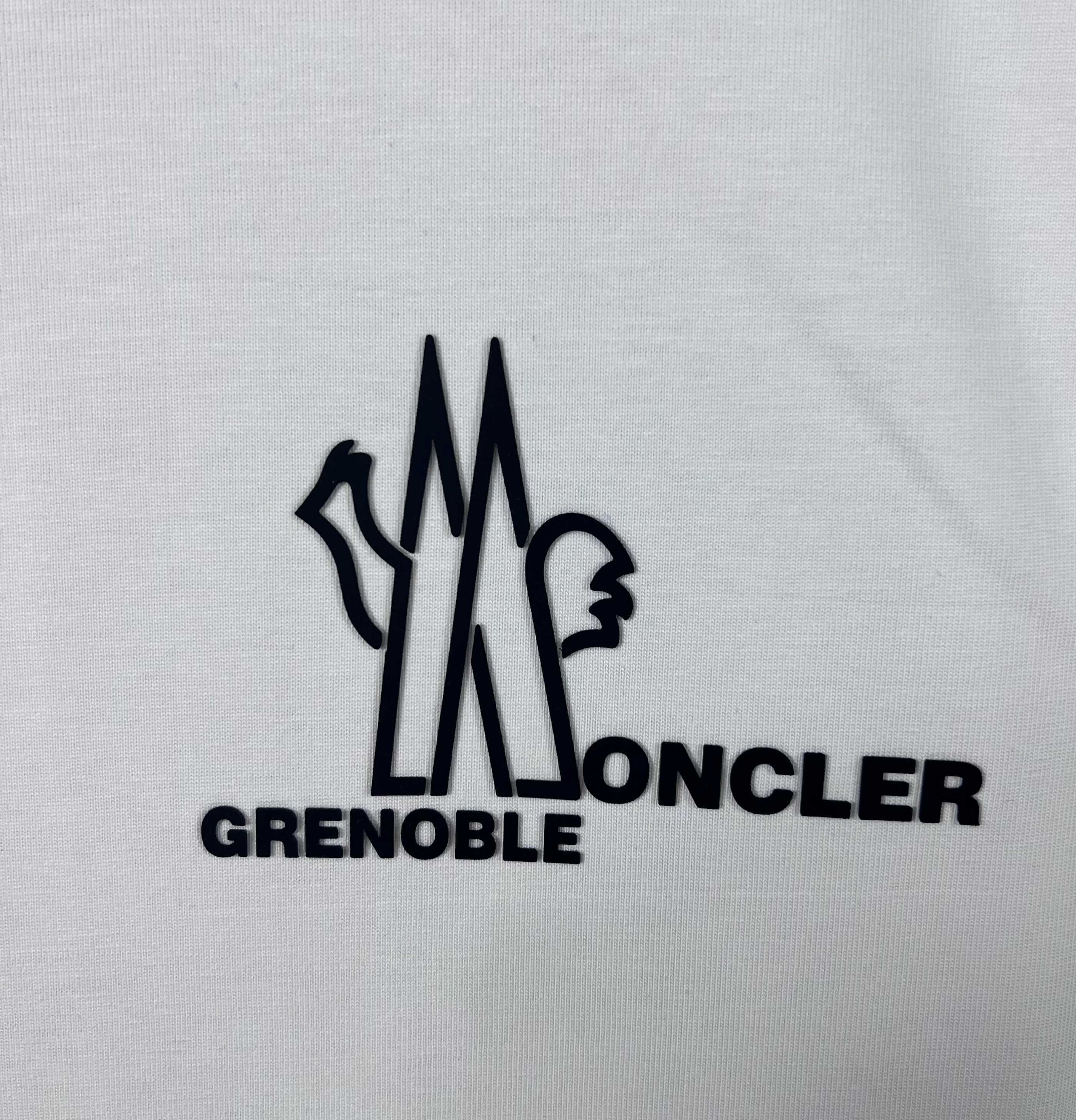 Moncler Grenoble logo graphic on white sweatshirt front