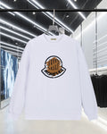 White Moncler long-sleeve sweatshirt with round chest logo patch