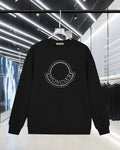 Black long-sleeve sweatshirt with rhinestone Moncler logo on the chest