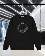 Black long-sleeve sweatshirt with rhinestone Moncler logo on the chest