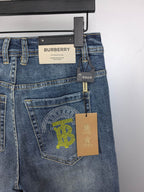 Denim pants back patch with Burberry tag and logo graphic on pocket